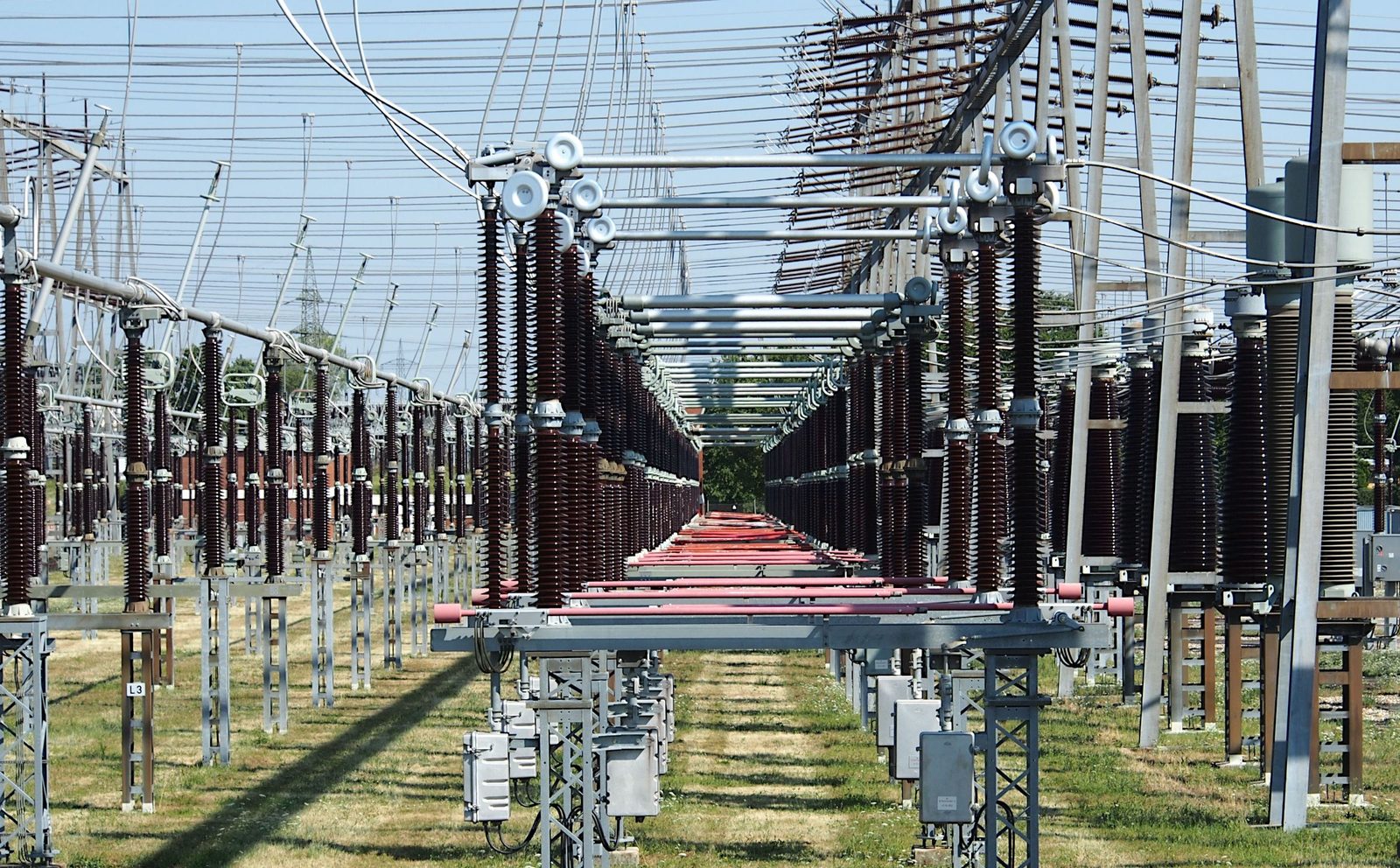 380 kV disconnect switches in substation switchyard